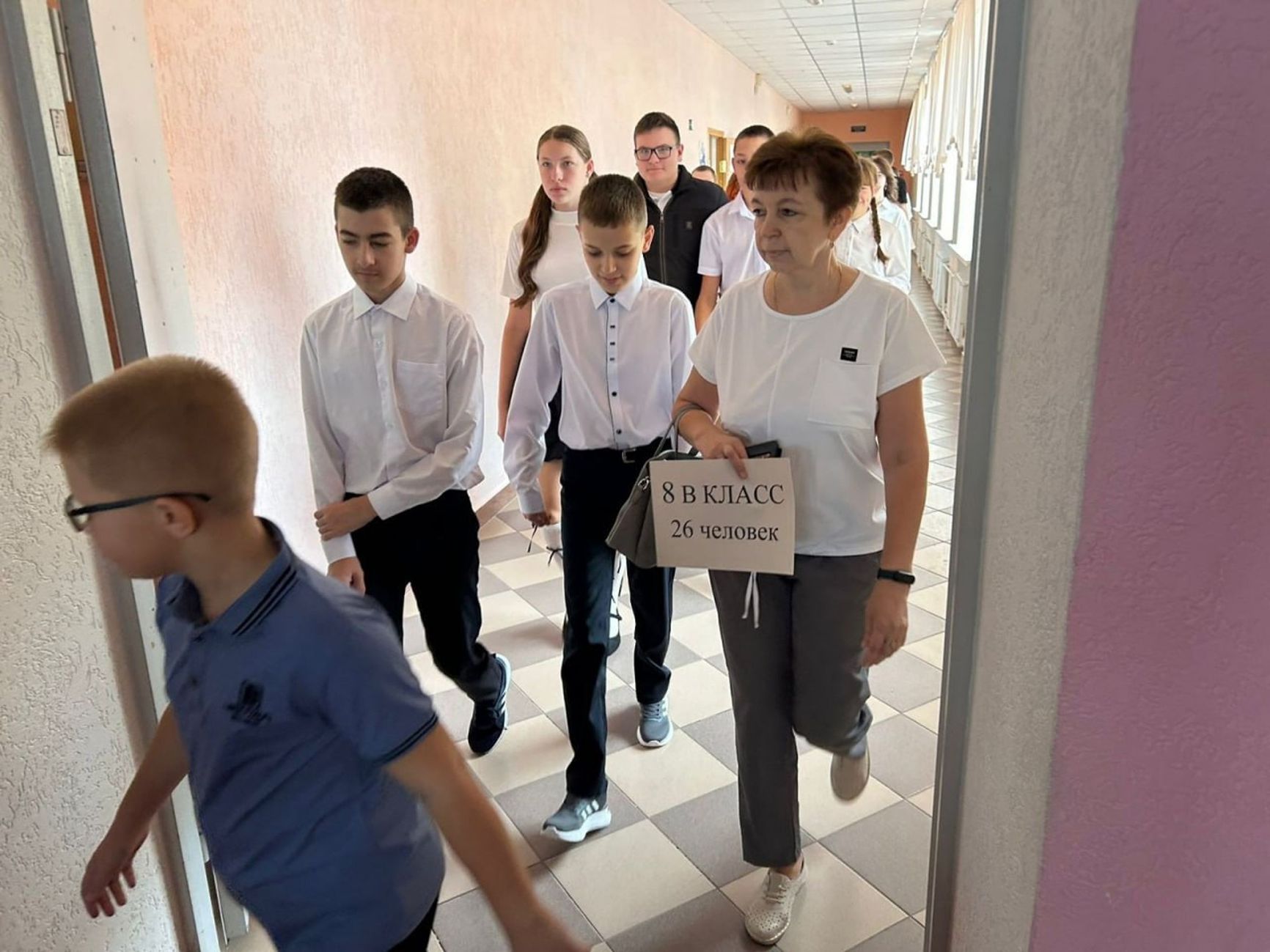 A teacher and her class in a Belgorod school